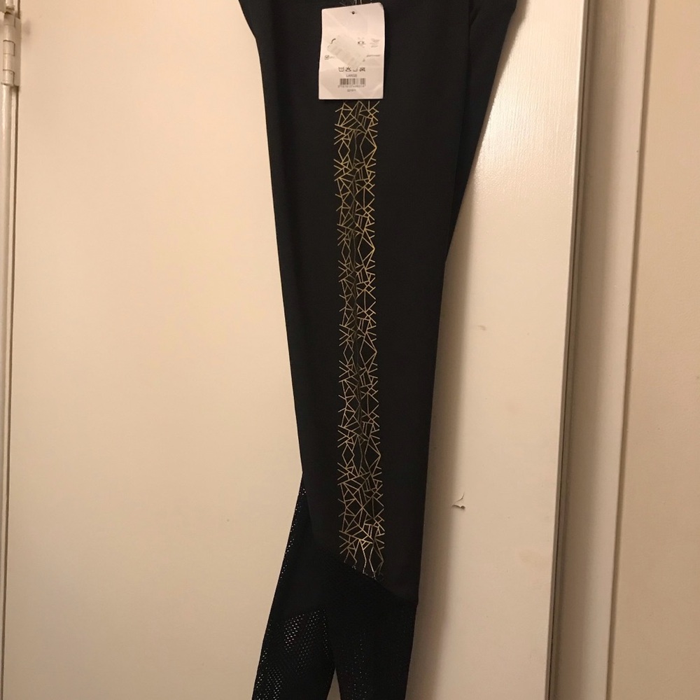 AK2 black with gold leggings